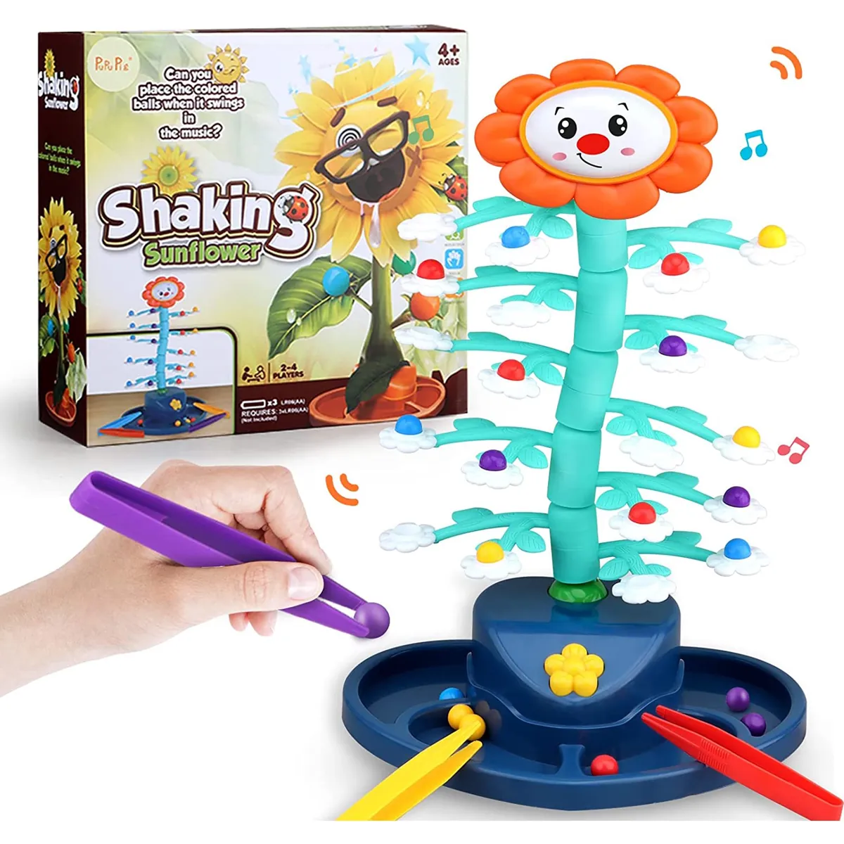 Jeu Shaking Sunflower installé : le tournesol musical sur sa base, des billes de couleur sur ses feuilles et les pinces en plastique