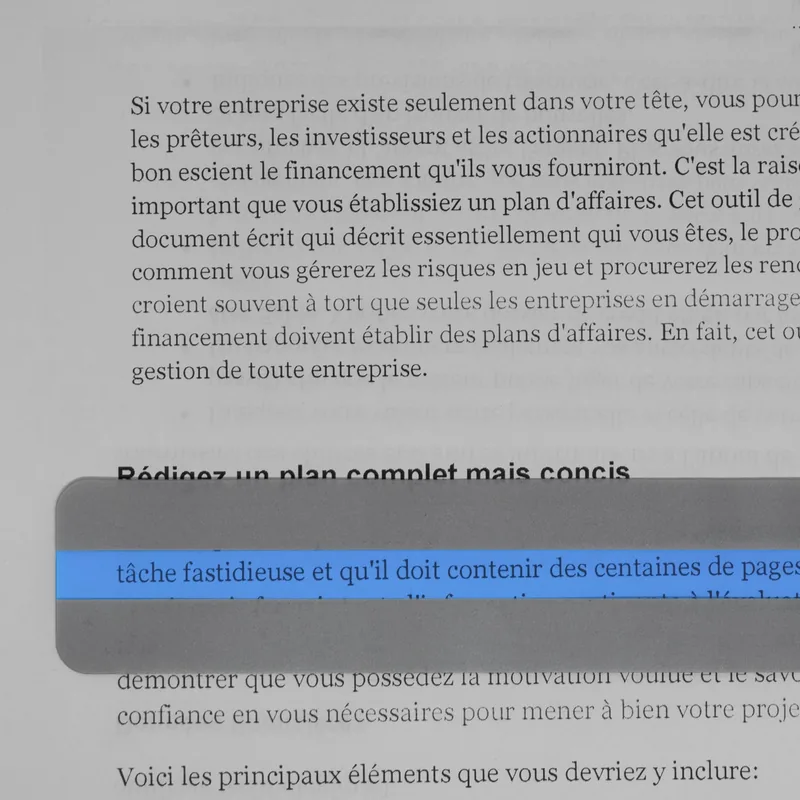Règle de lecture bleue qui surligne une ligne de texte